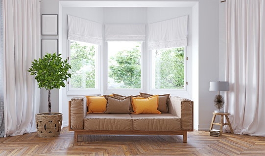 imagen de un living con piso de parquet, sillon y cortinas blancas en dos ventanas