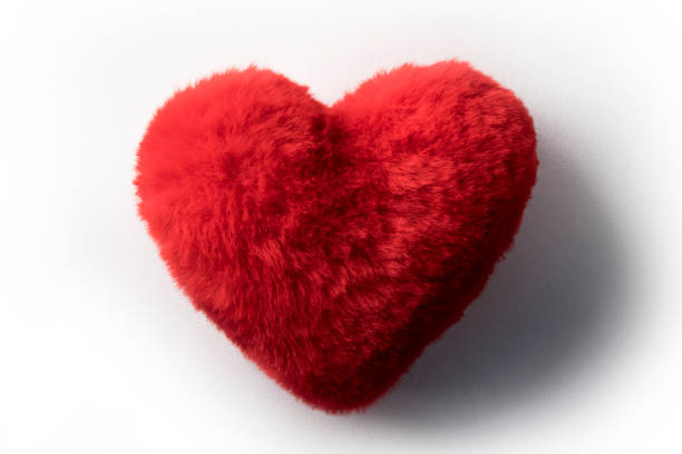 imagen de almohadon de pana rojo con forma de corazon